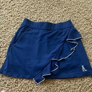 Blue Ruffled Unbridled Golf Skirt with White Trim And Built in Shorts